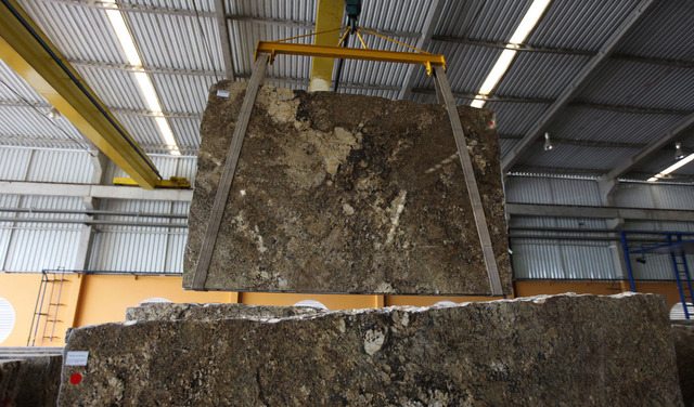 large slab of granite hanging from ceiling